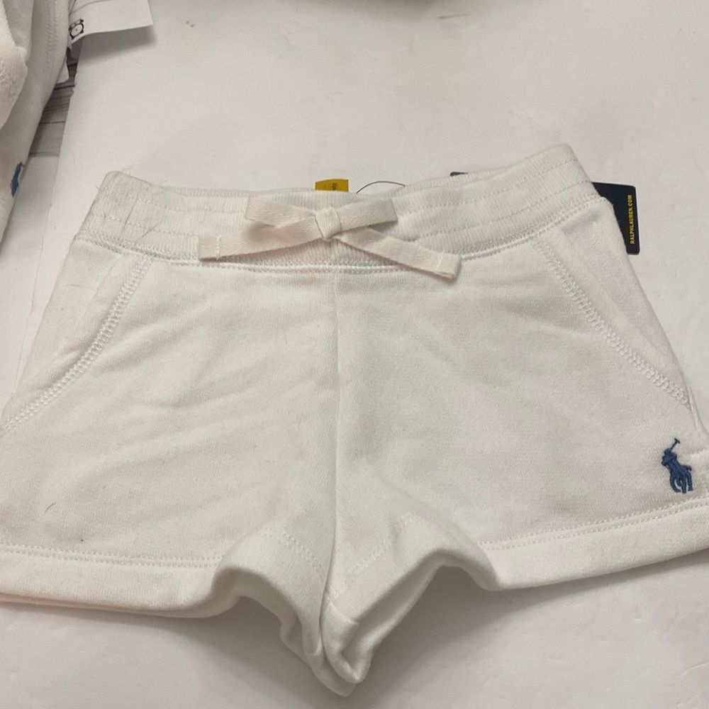 Polo children white drawing slit pockets 60 %cotton 40 % polyester brand new